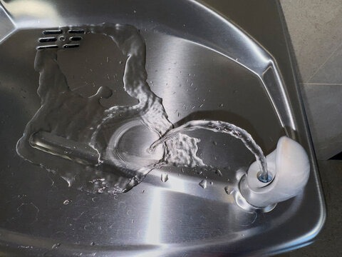 Water fountain in use  in basin for thirst 