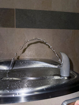 Water fountain in use  in basin