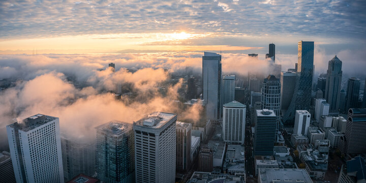 Hazy Sunrise Over Seattle Buildings Aerial View - Powered by Adobe