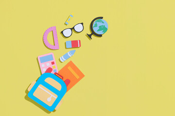 Colorful stationery on yellow background