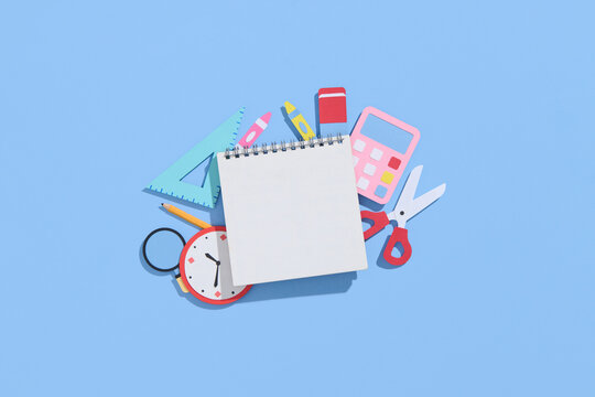 School Supplies Flat Lay On Blue Background