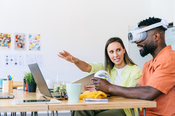 Team discussion with virtual reality technology in modern office