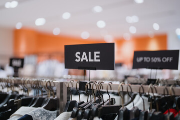 Sale Sign in Clothing Store