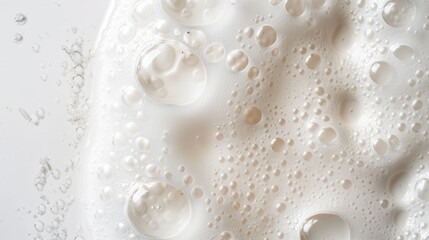 Textured background of white foam bubbles, ideal for beauty, cleaning, and hygiene concepts