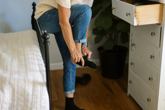 woman getting dressed the morning 