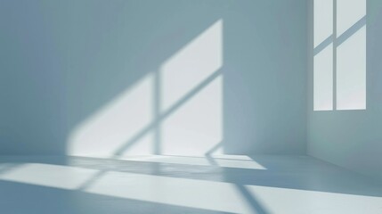 Sunlight streams through a window casting shadows on a white wall and floor.
