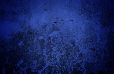 Old cracked wall background, dirty grunge texture. Paint peeling plaster walls. the cement walls...