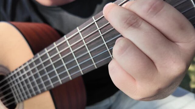 Playing guitar in slow motion