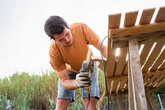 man doing carpentry work for the house