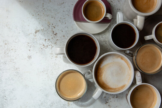 Overhead image of lots of cups of coffee