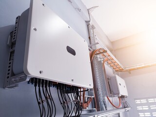 Instalation control of inverters solar panel on the wall.Technology of solar energy. Green energy...
