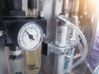 Repair and service vaccination machine spray for poultry hatchery production.