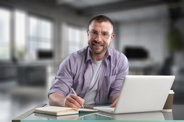 Happy professional business man work in office