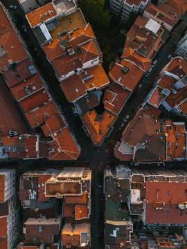 Top-Down View of Urban Intersection and Rooftops
