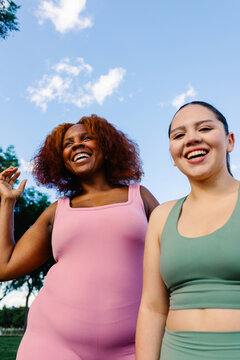 Curvy friends spend quality time together on an afternoon outing