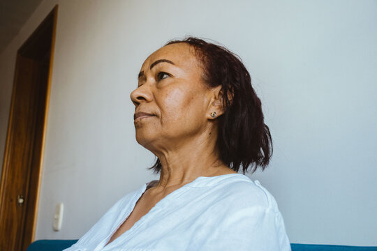 Close-Up Portrait of a 65-Year-Old Woman 