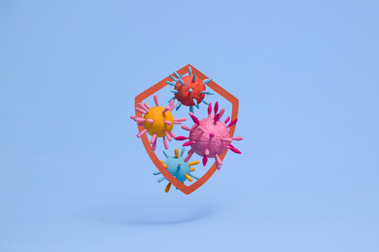 Colorful Virus Cells and Shield on Blue Background