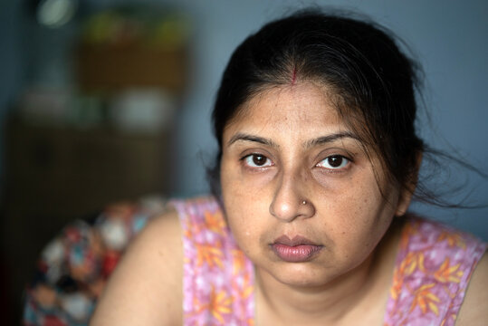 Portrait of an Indian woman inside Home