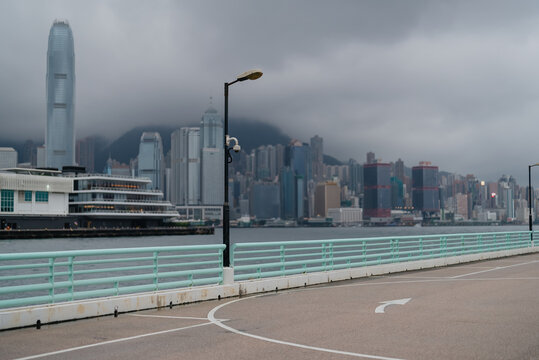 City Skyline with Streetlamp on Overcast Day