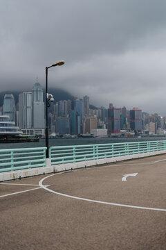 City Skyline with Streetlamp on Overcast Day