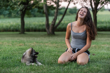 A girl and her puppy