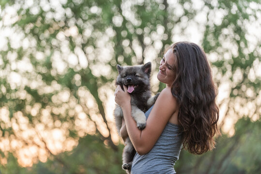 A girl and her puppy