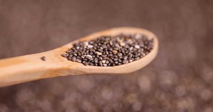 black and white chia seeds for a healthy diet, a large number of chia seeds for adding to yogurts, desserts and other food products
