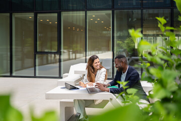 Coworkers Having Conversation Outside Office