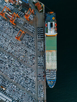 High Angle View of Shipping Port with Docked Cargo Ships