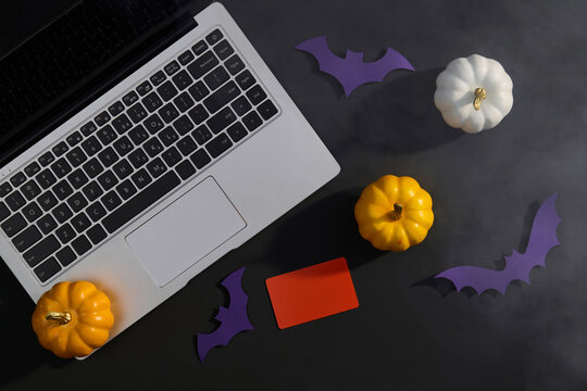 Halloween Shopping With Laptop, Pumpkins, Bats and Credit Card