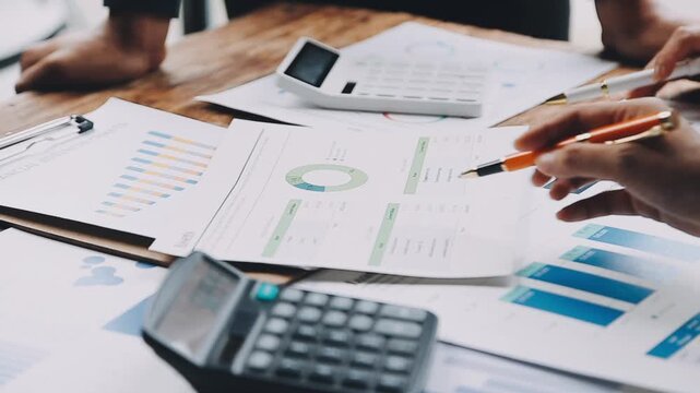 business documents businessman check legal document review Prepare documents or analysis reports, tax items, accounting documents, data contracts, office partner agreements.