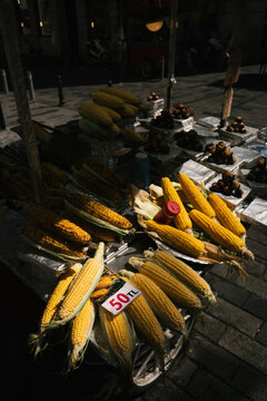 Street Vendor Selling Corn and Chestnuts