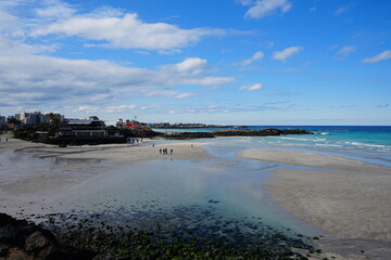 fine shoaling beach and charming clouds