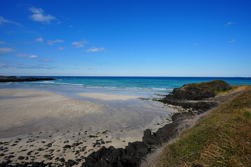 fine shoaling beach and charming clouds