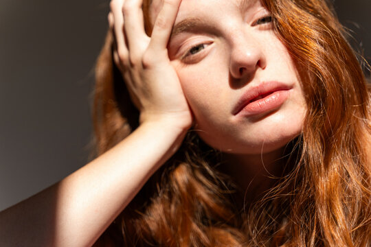 Woman with Blurred Eyes in Sunlight