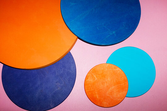 Geometric colorful disc circle shapes with hard direct flashlight