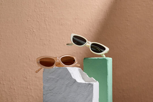 Modern Sunglasses Displayed on Colored Concrete Blocks