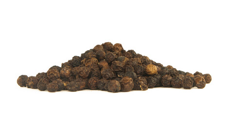 pile of black peppercorns isolated on a white background