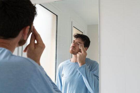 Man Grooming in Bathroom

