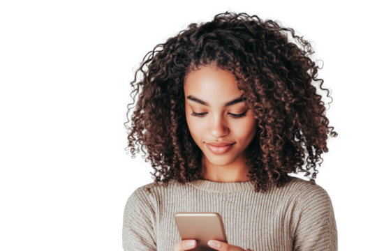 Young black woman with curly hair using and looking at phone. Isolated on transparent background, copy space.