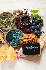 Adaptogen healthy food. Herb and spice collection on light background