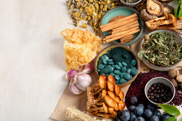 Adaptogen healthy food. Herb and spice collection on light background