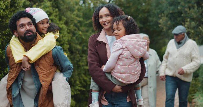 Happy, nature and family generations walking in national park for winter holiday, getaway or adventure. Smile, piggyback and kids with parents and grandparents in field for weekend trip in Colombia.