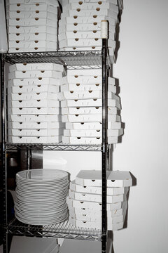 big mountain of pizza boxes