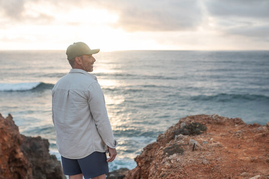 traveling man discovering a nice beach