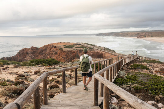 traveling man discovering a nice beach