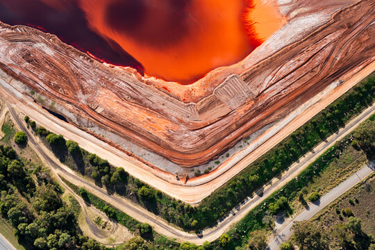 Aerial views over large industrial tailing ponds
