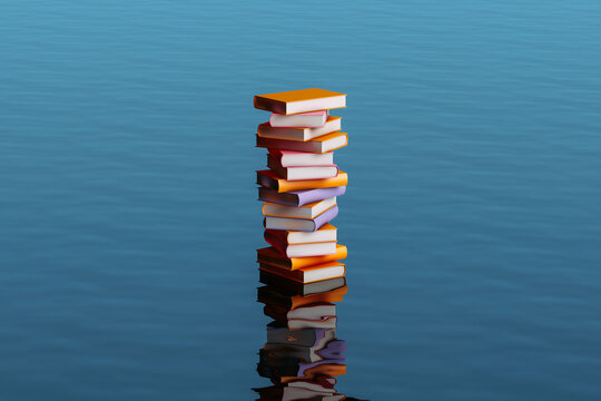 Books stacked on blue water