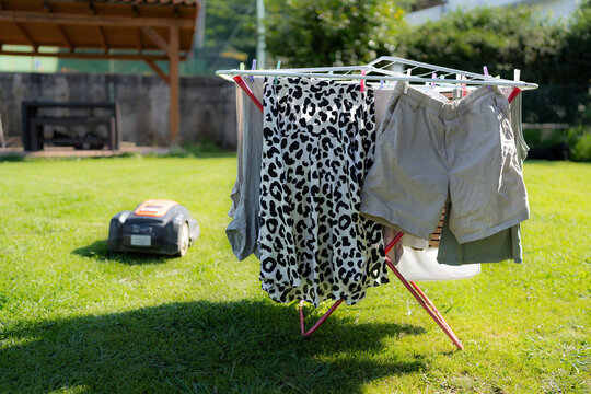 Clothes drying on a clothesline in a green garden