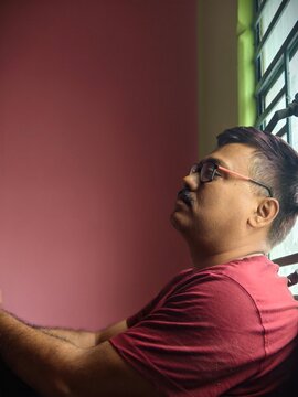 Different mood of an Indian man inside home 